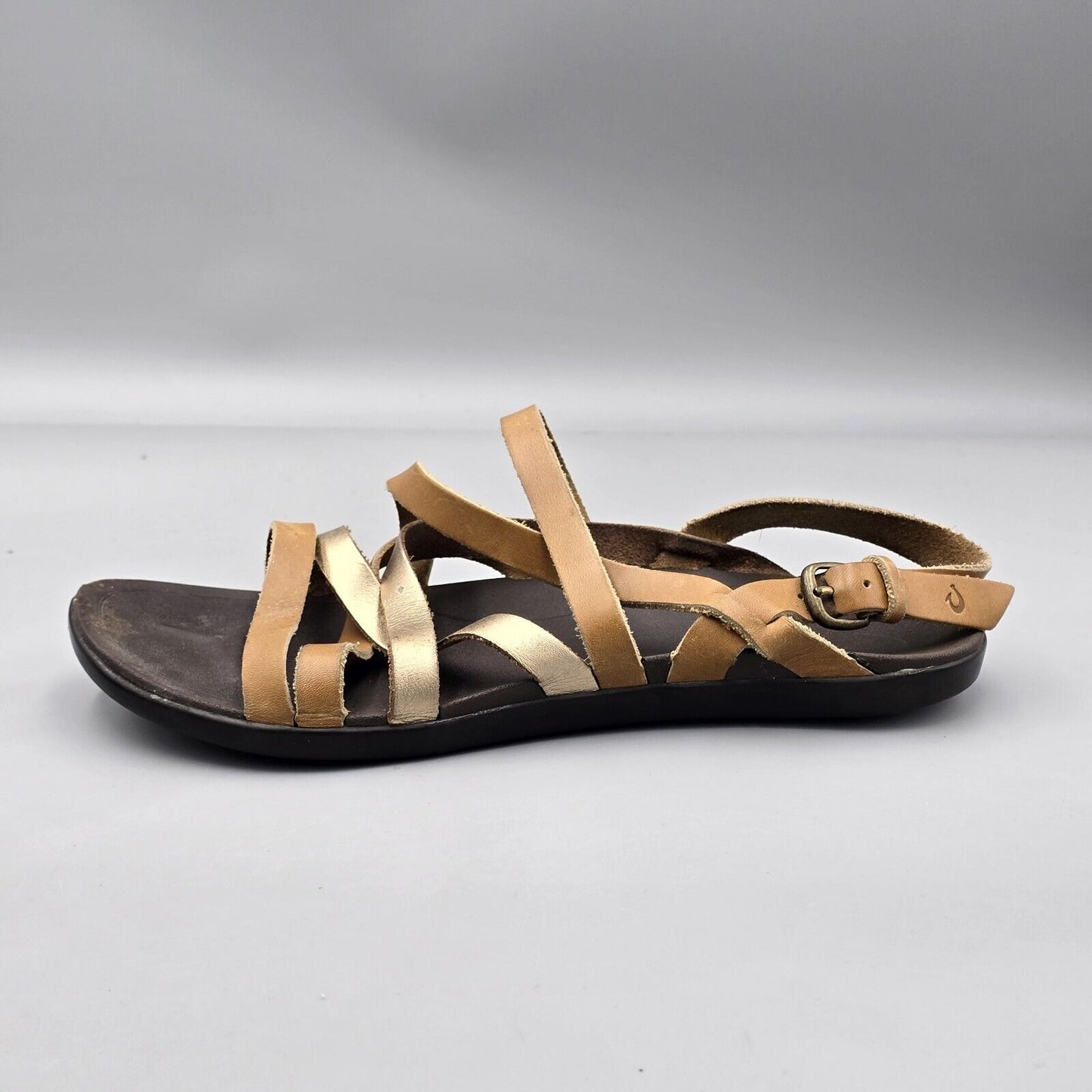 OLUKAI Awe Awe Women’s Size 9 US Brown Gold Stap Leather Buckle Strappy Sandals