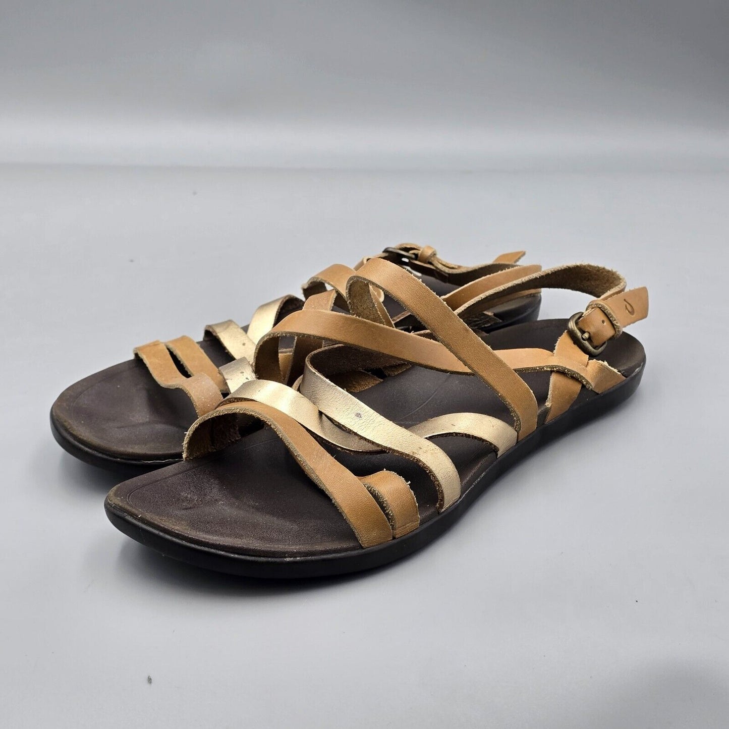 OLUKAI Awe Awe Women’s Size 9 US Brown Gold Stap Leather Buckle Strappy Sandals