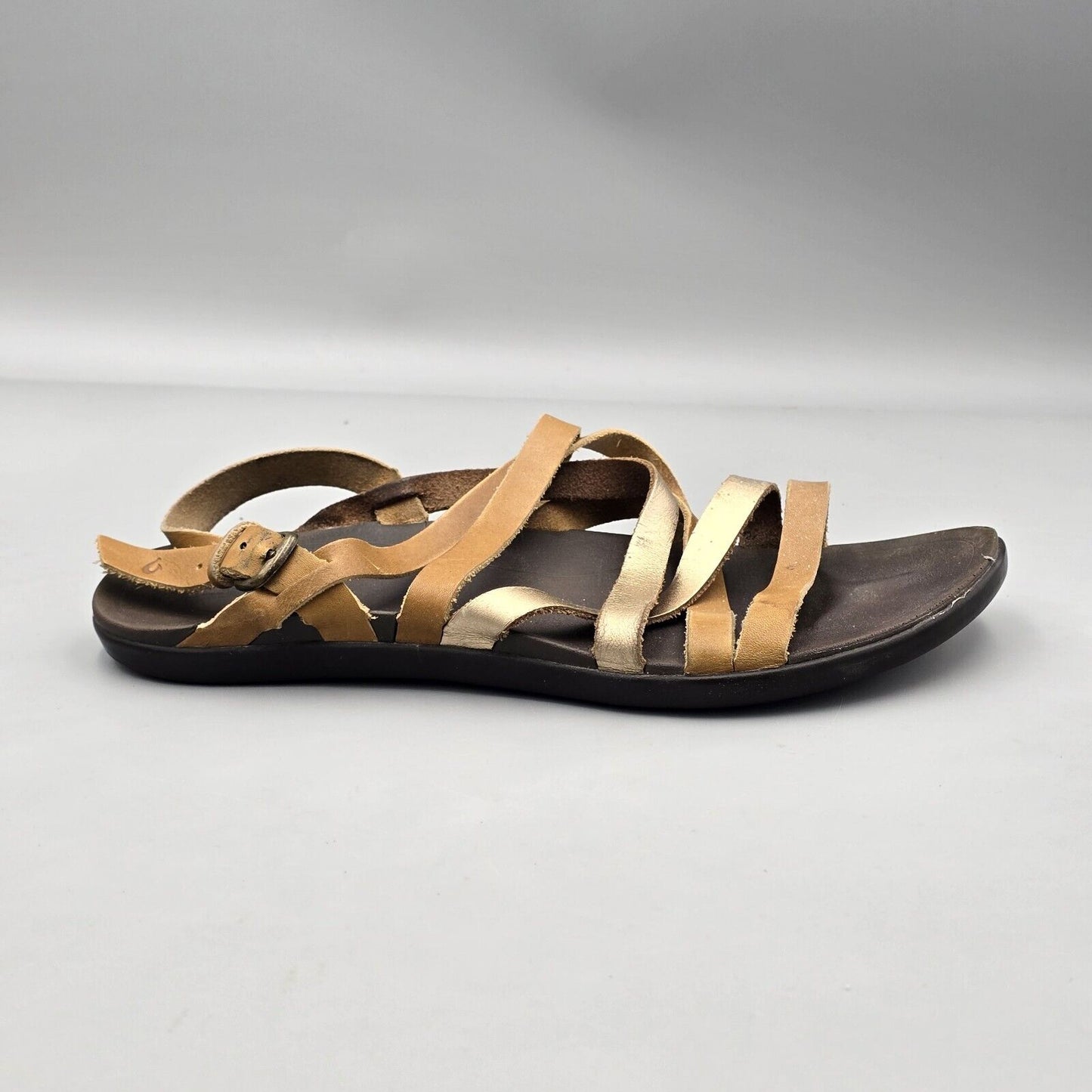 OLUKAI Awe Awe Women’s Size 9 US Brown Gold Stap Leather Buckle Strappy Sandals